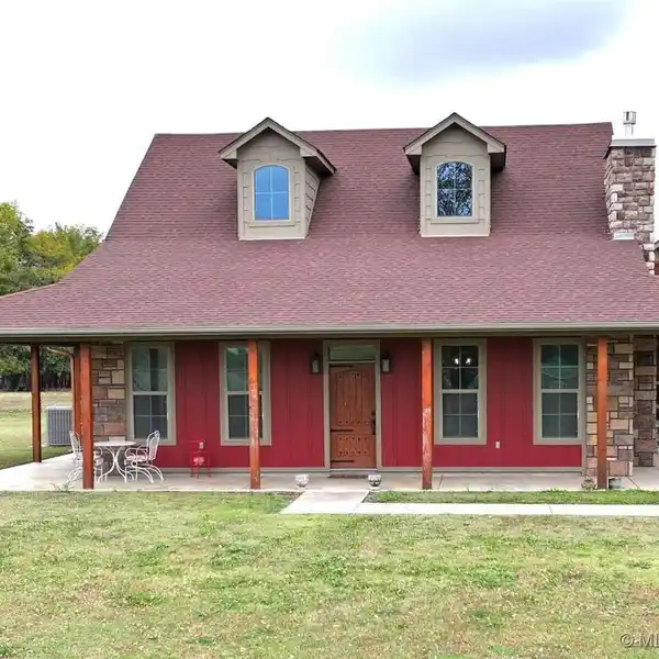 MAGNIFICENTLY BUILT HOME WITH POND