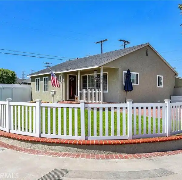 SPACIOUS LOT WITH PROFESSIONALLY LANDSCAPED YARD