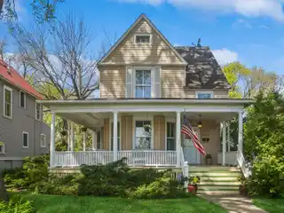 Tree-Lined Street with Wraparound Porch Delight