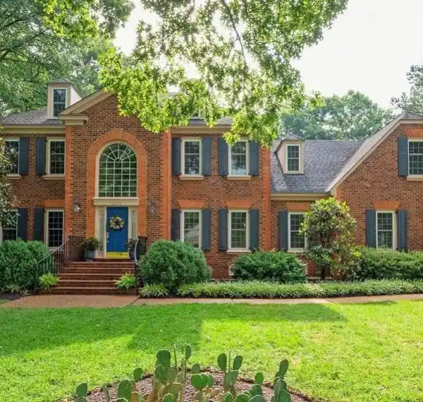 ELEGANT BRICK-FRONT COLONIAL HOME