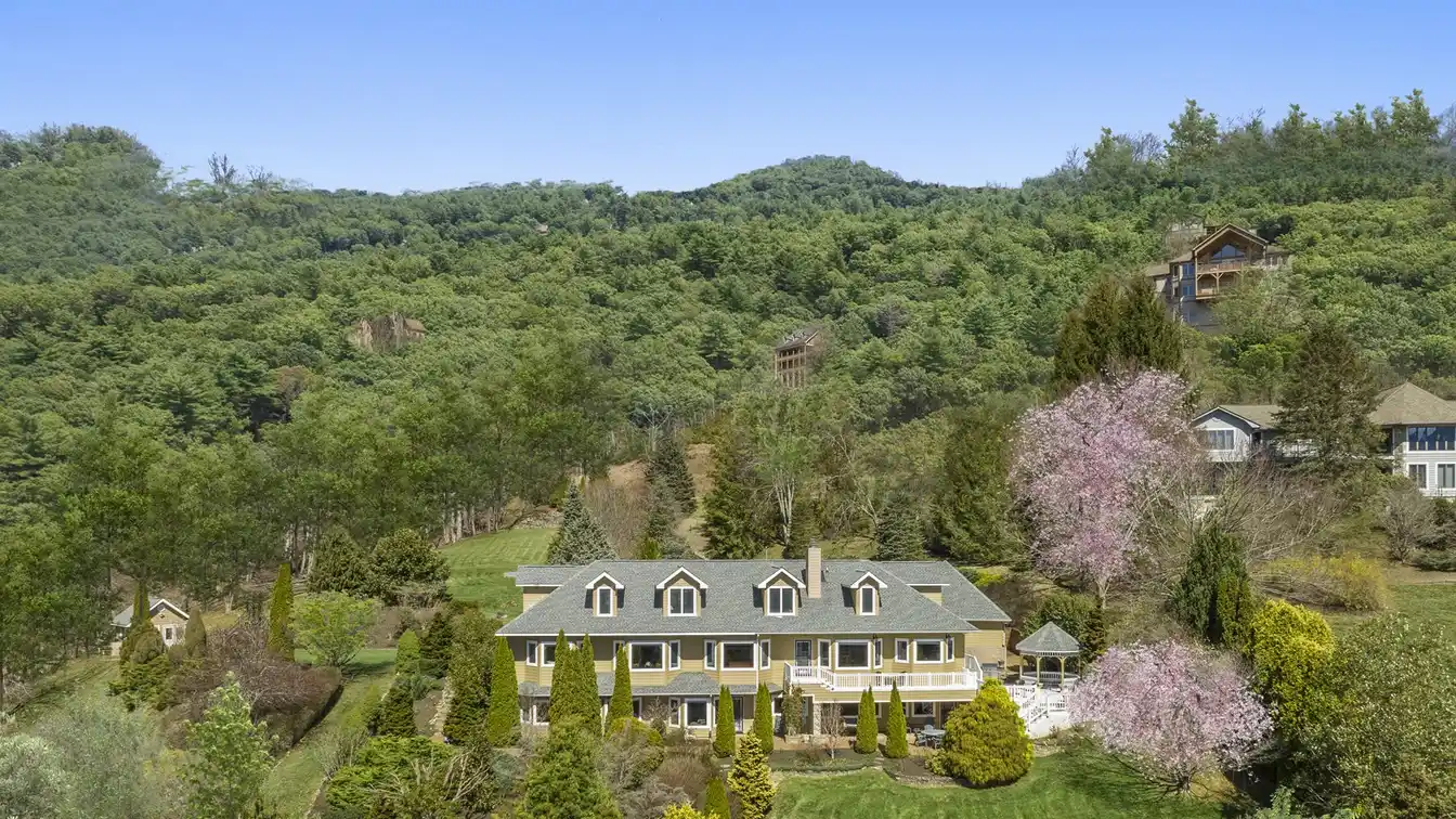 Exquisite English-style Country Estate Overlooking Laurel Ridge Country Club