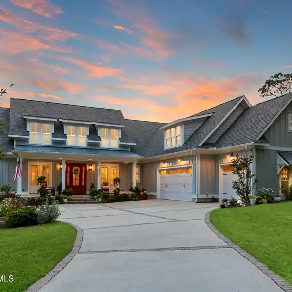 MAIN-LEVEL LUXURY WITH SUNLIT CAROLINA ROOM