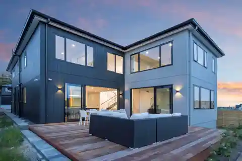 Architectural Coastal Haven with Soaring Cathedral Ceilings