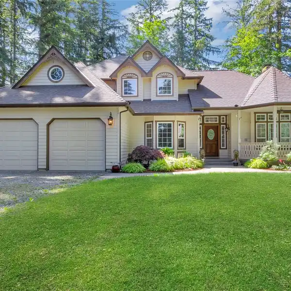 RARE PRIVACY ON THREE ACRES