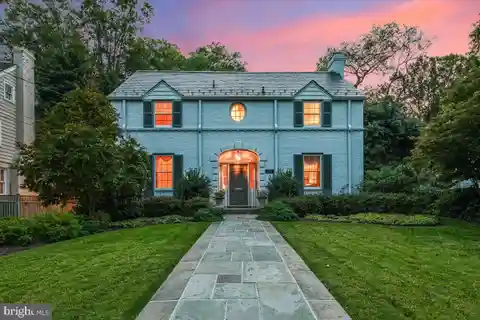 Timeless Colonial Charm with Garden Serenity