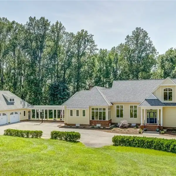 CUSTOM LAKEFRONT RETREAT ON OVER THREE ACRES