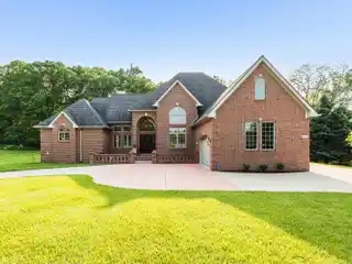 Artfully Crafted Estate in Prestigious Upper Glade