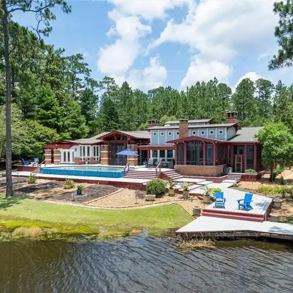 ARCHITECTURAL LAKEFRONT MASTERPIECE WITH INFINITY POOL