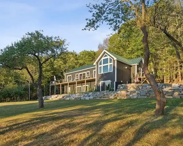 STUNNING RIVERFRONT RETREAT CAPTURES ESSENCE OF MODERN COASTAL LIVING