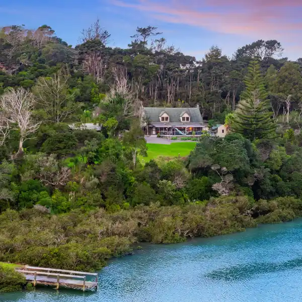 SECLUDED WEITI RIVER RETREAT WITH PRIVATE JETTY