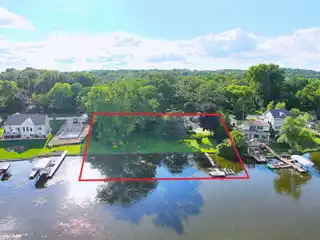 Rare Riverfront Estate with 200’ Frontage