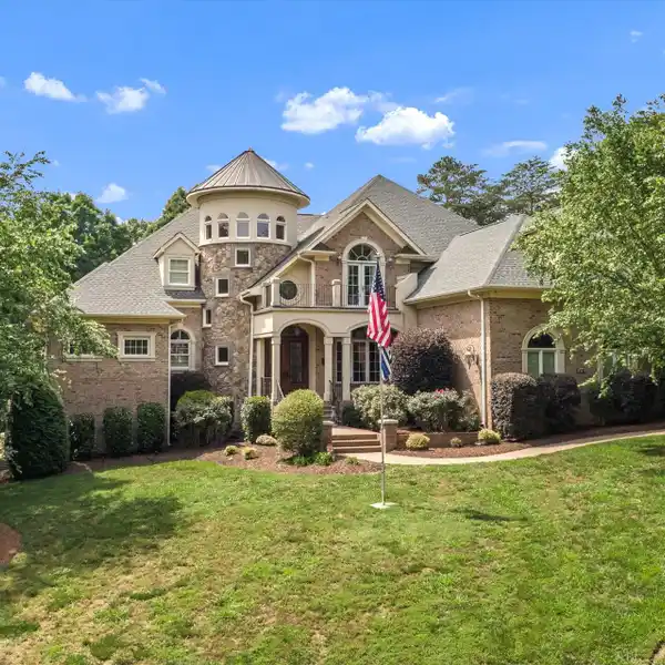 ELEGANCE AND SOPHISTICATION ABOUND IN THIS STATELY CUSTOM ESTATE