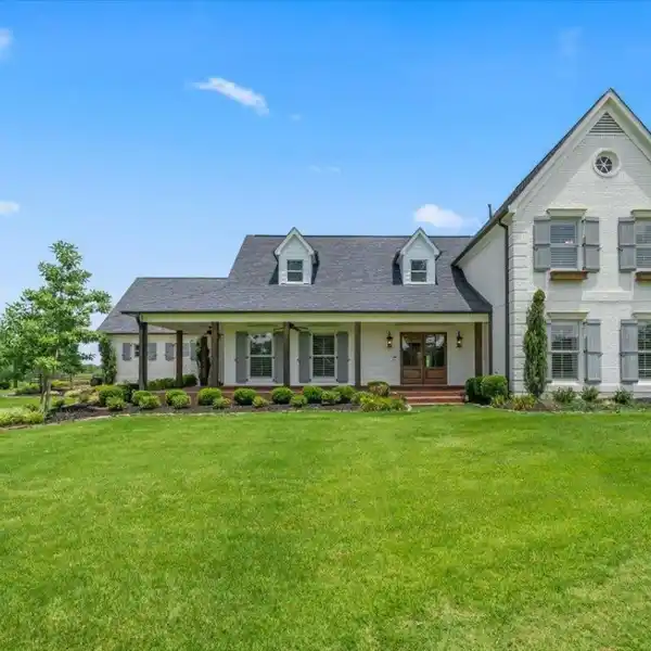 UPGRADED FARMHOUSE ON SEVEN ACRES