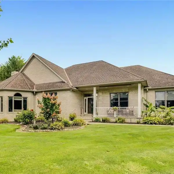 BEAUTIFULLY MAINTAINED RANCH COMPLETE WITH A PRIVATE POND
