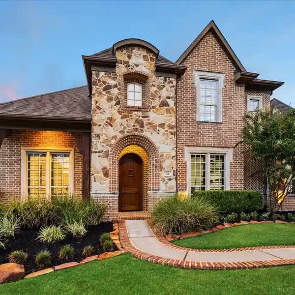 SPACIOUS CREEKSIDE HOME WITH LUXURY UPGRADES