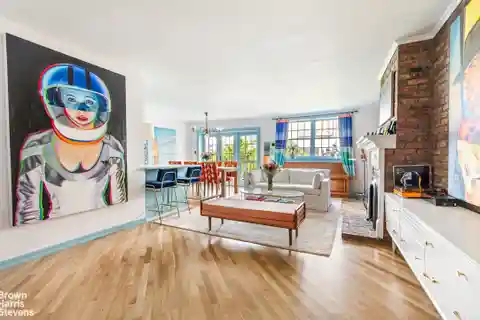 Sun-Drenched Duplex with Large Balcony