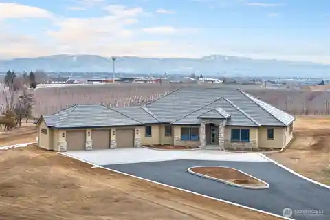 Modern Luxury on over Three Acres in a Gated Community