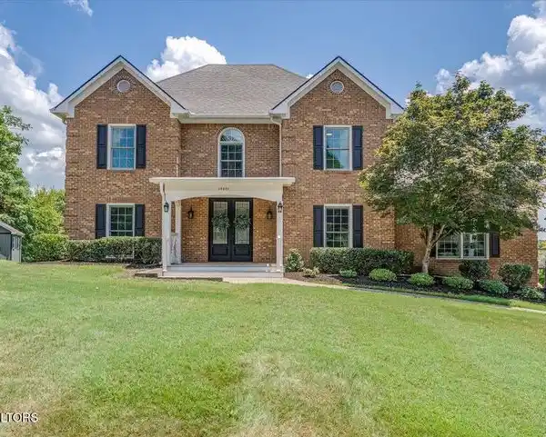STUNNING BRICK HOME WITH FINISHED BASEMENT
