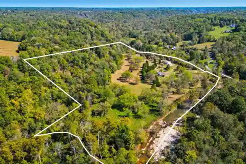 Private Creekfront Estate with Unparalleled Privacy