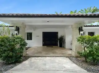 Elevated Living in Gated One-Acre Pinecrest Estate