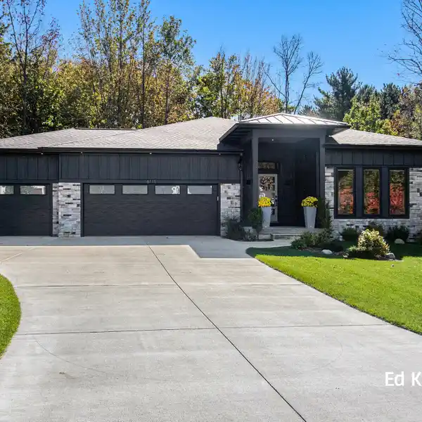 STUNNING CONTEMPORARY RANCH IN THE RAVINES GOLF COMMUNITY