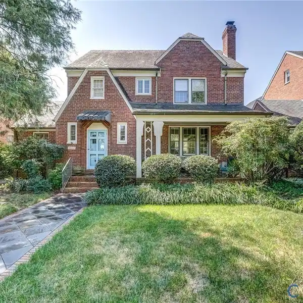 TIMELESS 1930S TUDOR BRICK AND SLATE HOME