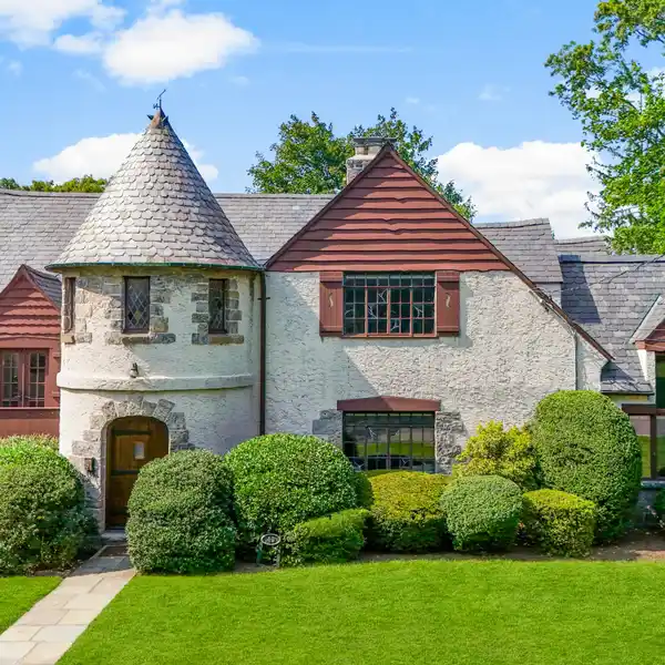 STRIKING TUDOR HOME COMBINES ARCHITECTURAL CHARACTER WITH UNBEATABLE LOCATION