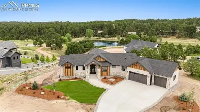 Exquisite Modern Retreat on Premier Pond-side 1-acre Lot