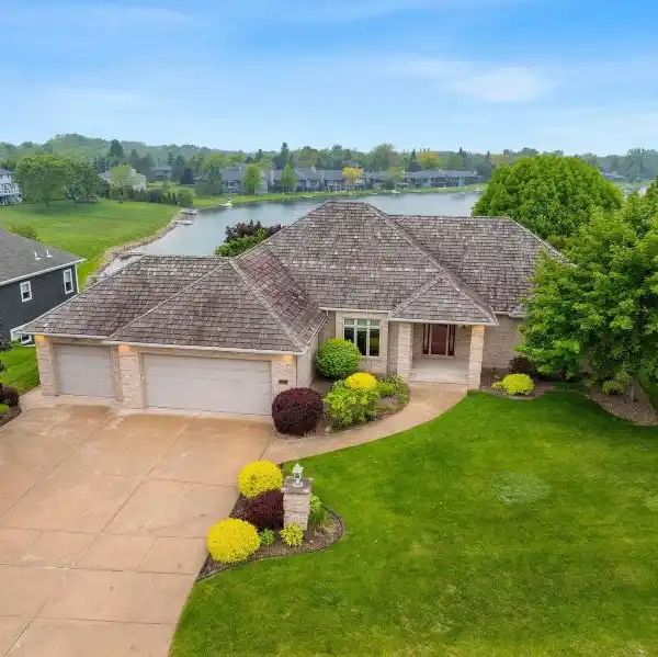 CUSTOM WALKOUT RANCH WITH PRIVATE DOCK