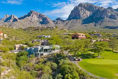 Modern Elegance Overlooking Fairways and Sunset Vistas