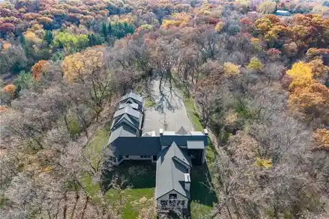 One-of-a-kind Retreat on a Secluded Wooded Acreage