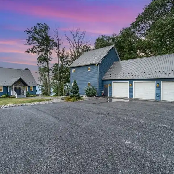 STUNNING ONEIDA LAKEFRONT ESTATE WITH GUEST HOUSE