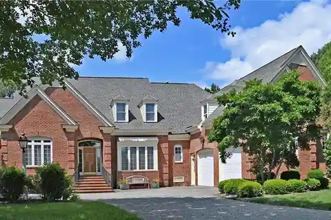 Gorgeous Pond-Front Brick Home