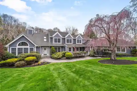 Impeccable Colonial Nestled on Almost 2 Private Acres