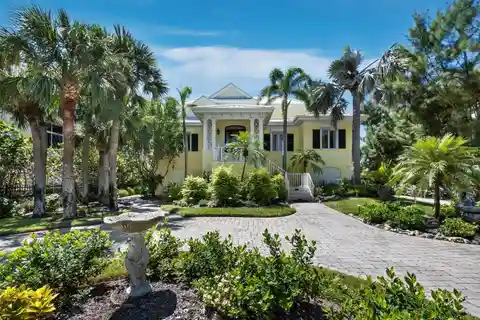 Gulf-Front Masterpiece with Bayside Boathouse
