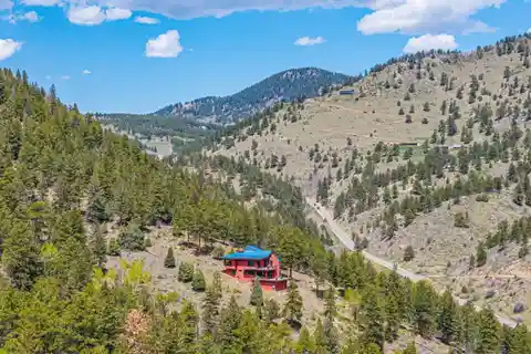 Eco-Modern Escape with Forest, Stream, and Pond