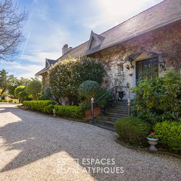 GRAND BOURGEOIS HOME WITH LUSH GARDENS