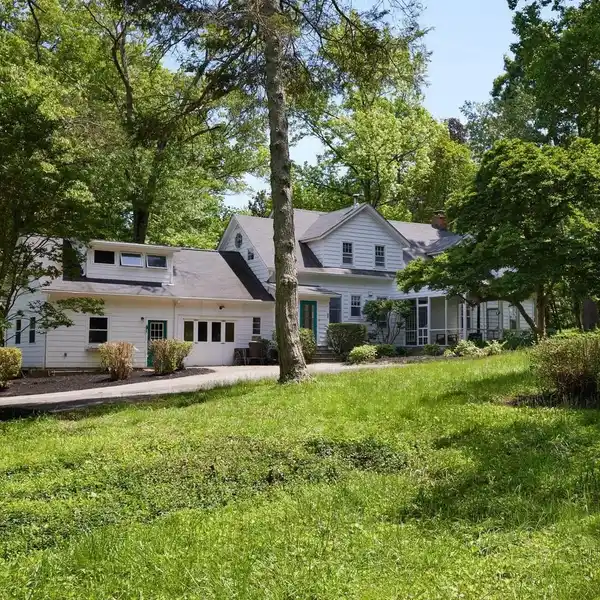 CHARMING CAPE COD HOME ON A 19-PLUS-ACRE RETREAT