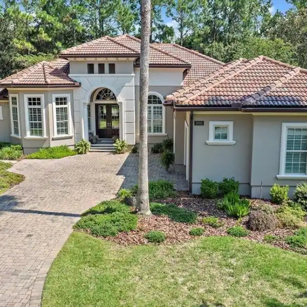 PRIVACY AND LUXURY IN A SOUGHT-AFTER GATED COMMUNITY