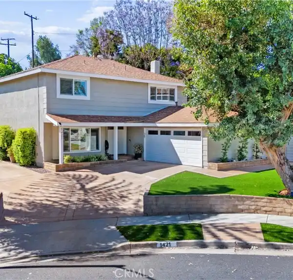 DESIGNER UPGRADES MEET SPACIOUS FAMILY LIVING