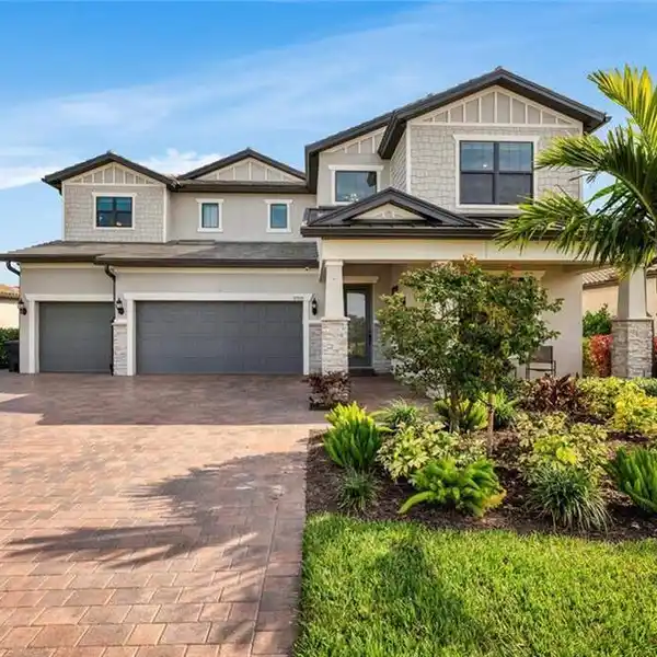 UPGRADED CUSTOM ESTATE HOME IN THE PLACE AT CORKSCREW