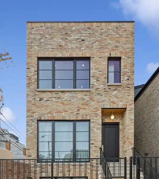 ALL-MASONRY HOME ON A BUCKTOWN CORNER LOT