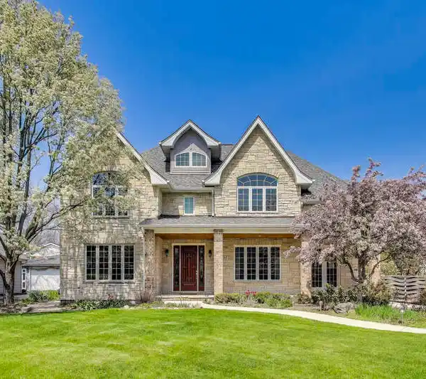 DISTINGUISHED BRICK AND STONE RESIDENCE