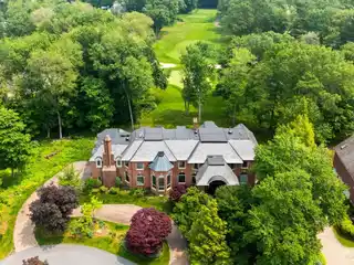 Custom All-brick Colonial with Breathtaking Golf Course Views