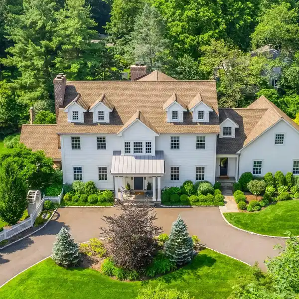 STUNNING COLONIAL ON A MANICURED LOT