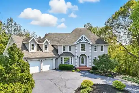 Beautiful Colonial Home Situated on Three Picturesque Acres