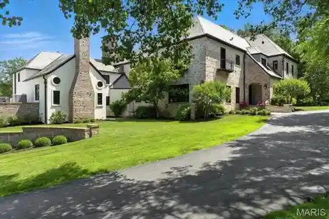 Timeless French Manor on Private 1.17 Acres