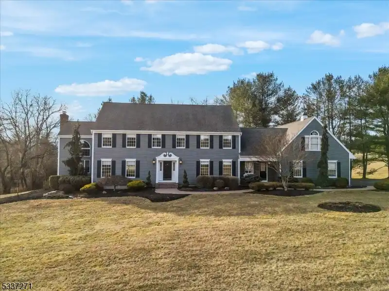 Impeccably Maintained Center Hall Colonial