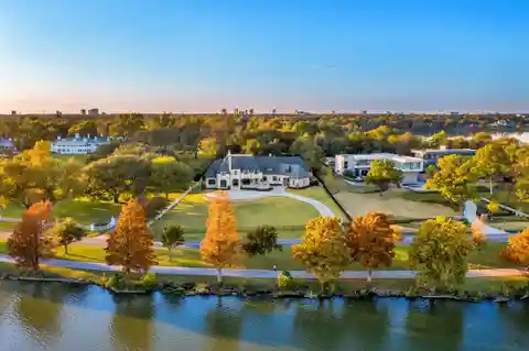 Exceptionally Designed French Transitional Home on an Unparalleled Gated Lot