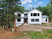 MODERN FARMHOUSE ON OVER FIVE PRISTINE ACRES